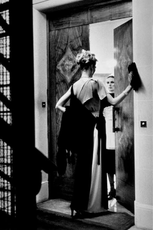 Alt Tag: Helmut Newton 16th Arrondissement Paris 1976 vintage silver gelatin print, woman at doorway with maid in Paris 16th arrondissement