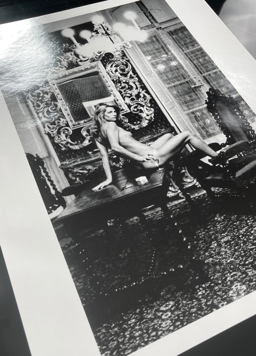 Alt Tag: Helmut Newton Charlotte Rampling Hotel Nord 1975 vintage silver gelatin print black-and-white portrait on table with ornate mirror