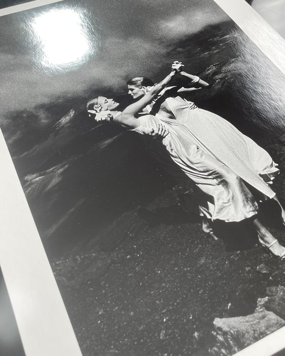 Alt Tag: Helmut Newton Cheryl Tiegs Rene Russo Hawaii 1974 vintage silver gelatin print, 20x24 photo of two women in flowing dresses dancing on rocks