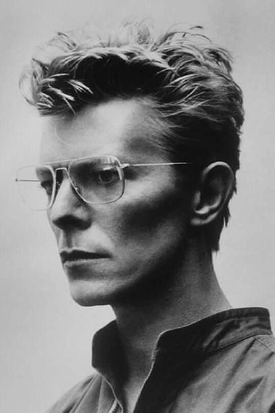 Helmut Newton David Bowie Monaco 1983 silver gelatin print vintage portrait of David Bowie wearing glasses, closely cropped black-and-white photo