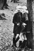 Helmut Newton Gemelas Twins YSL French Vogue 1982 vintage silver gelatin print, black-and-white photo of twin models in YSL coats kissing