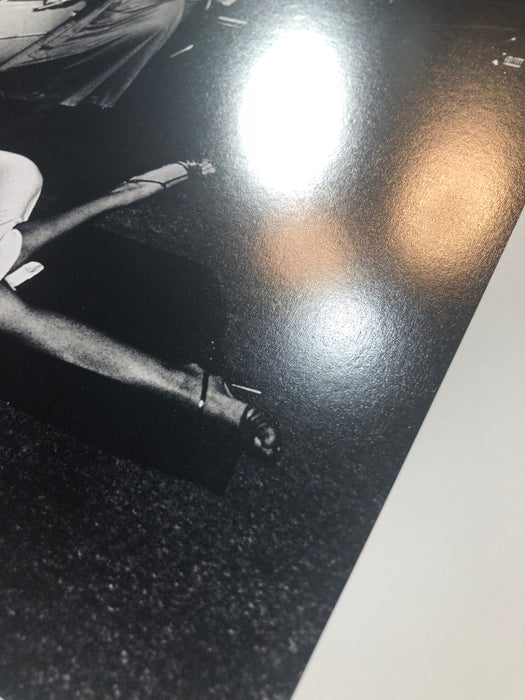 Alt Tag: Helmut Newton Hollywood Cadillac 1976 vintage silver gelatin print close-up of glossy black-and-white photograph on paper