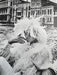 Alt Tag: Helmut Newton Model in Venice 1966 vintage silver gelatin print, couture model in feathered look by Venice Grand Canal, 20x24