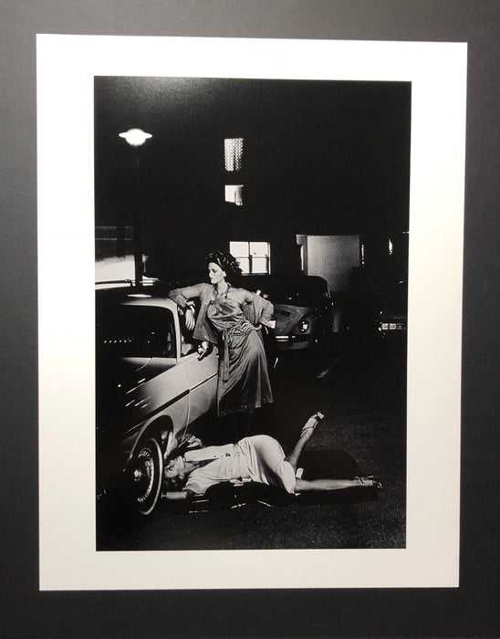 Helmut Newton Models Inspecting Brake Lining vintage silver gelatin print, Paris 1977 photo of models by car at night, 20x24