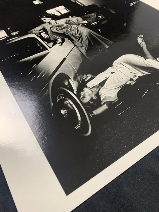 Helmut Newton Models Inspecting Brake Lining vintage silver gelatin print 20x24, Paris 1977 models by car tire in black-and-white