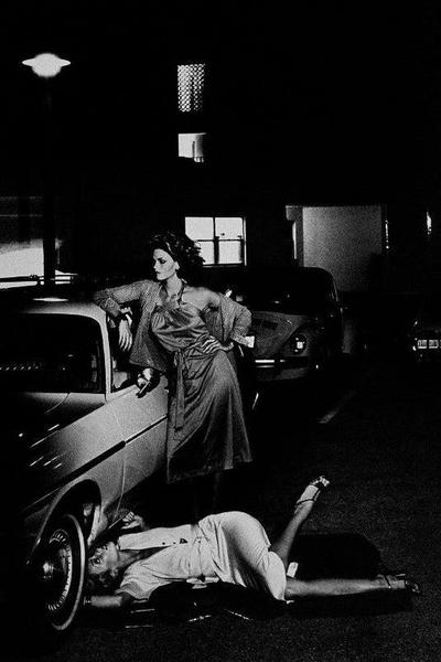 Helmut Newton Models Inspecting Brake Lining vintage silver gelatin print, Paris 1977 staged fashion scene by car at night