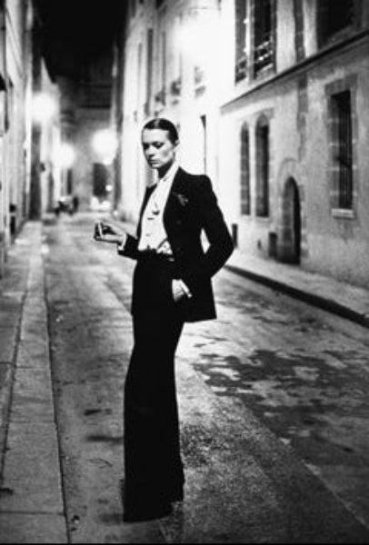 Helmut Newton Rue Aubriot Paris 1975 vintage silver gelatin print black and white photo of woman in tuxedo on Paris street at night
