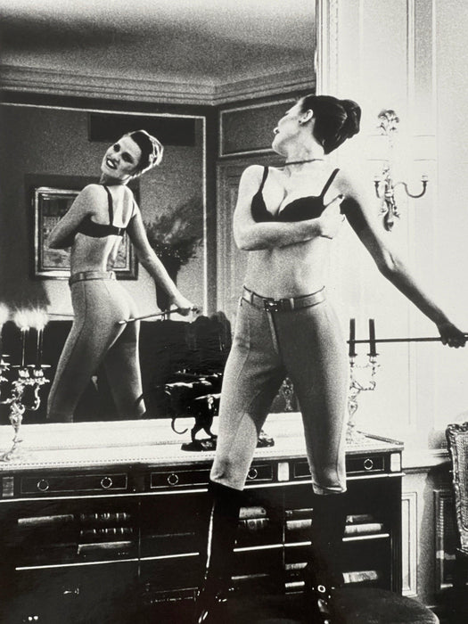 Alt Tag: Helmut Newton Saddle I (Bettina) vintage silver gelatin print mirrored Paris bedroom Bettina with whip, 1976 black-and-white photo