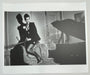 Helmut Newton Saddle II Paris 1976 vintage silver gelatin print 20x24 fashion photo of model on sofa, dramatic shadows, Paris 1976
