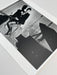 Alt Tag: Helmut Newton Saddle II Paris 1976 vintage silver gelatin print 20x24 fashion photograph, seated model with dramatic shadow