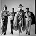 Helmut Newton Sie Kommen Dressed Paris 1982 vintage silver gelatin print, four fashion models in tailored suits and cape in studio