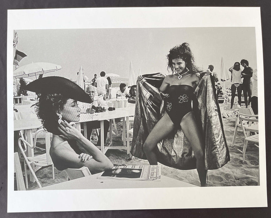 Helmut Newton Surprise St. Tropez 1981 vintage silver gelatin print beach fashion scene with model performing amid umbrellas and onlookers