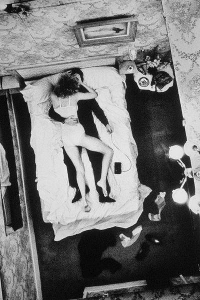 Helmut Newton Vivianne Hotel Volney 1979 silver gelatin print, overhead view of Vivianne reclining on hotel bed, vintage photo