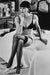 Alt Tag: Helmut Newton Vivianne Hotel Volney 1979 silver gelatin print vintage photo of Vivianne in lingerie seated on hotel bed, NYC
