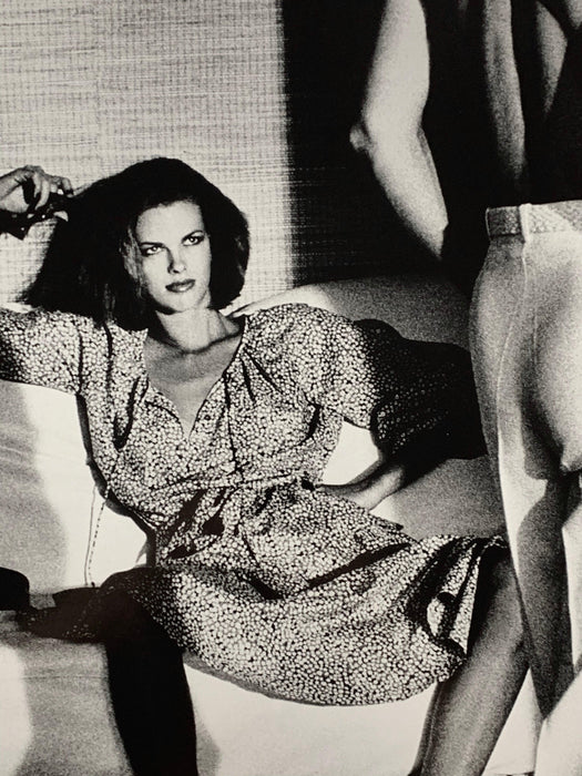 Alt Tag: Helmut Newton Woman Examining Man vintage silver gelatin print Vogue Saint-Tropez 1975 woman reclining as man stands nearby