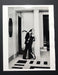 Alt Tag: Helmut Newton Woman Into Man Paris 1979 vintage silver gelatin print, black and white photo of model in tuxedo, Paris 1979